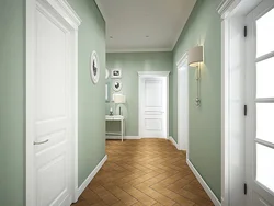 Hallway Design In An Apartment With White Doors Photo