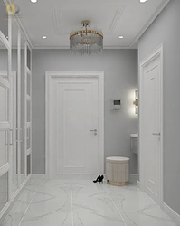 Hallway design in an apartment with white doors photo