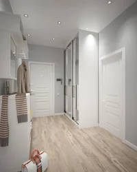 Hallway design in an apartment with white doors photo