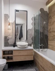 Bathroom design wood and gray tiles
