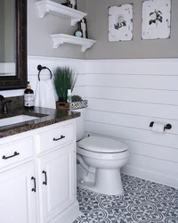 Bathroom design with half tiles