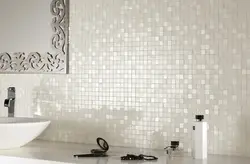 White bathtub with mosaic photo