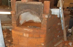 Photo of the stove from the bath