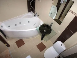 Design of a corner bathroom with a toilet and a washing machine combined