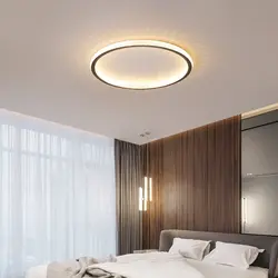 Design lamps on the ceiling in the bedroom