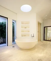Round bathtub in the bathroom interior