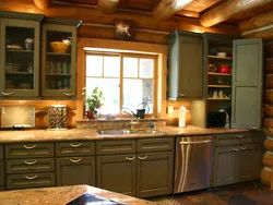 Кухня в своем деревянном доме с окном фото