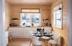 Kitchen in your wooden house with a window photo