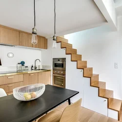Living room kitchen design with stairs to 2nd floor