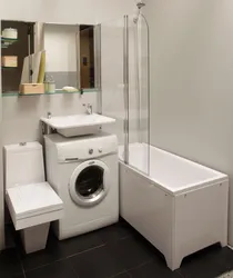 Bathroom design with bathtub and washing machine and sink