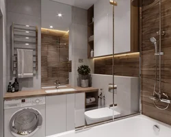 Bathroom design with bathtub and washing machine and sink