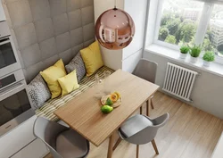 Kitchen design with sofa and dining table