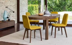 Kitchen with wooden table and chairs in the interior