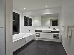 Bathroom design dark tiles and light