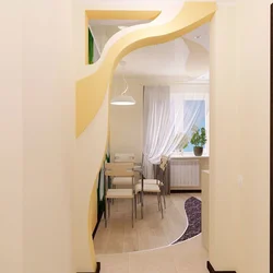 Photo of plasterboard arches between the kitchen and hallway