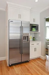 Two refrigerators in the kitchen photo