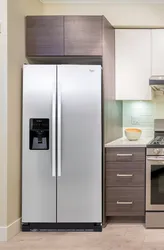 Two refrigerators in the kitchen photo