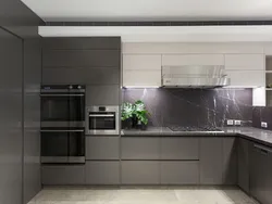 Gray kitchen with black countertop photo