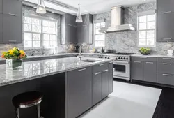 Gray Kitchen With Dark Countertop And Apron Photo