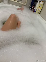 Photo in a bathtub with foam