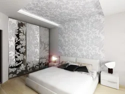 Photo of a wallpapered bedroom