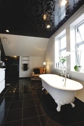 Bathroom interior with black ceiling