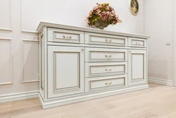 Light chests of drawers in the living room interior