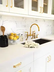 Kitchen design with gold handles