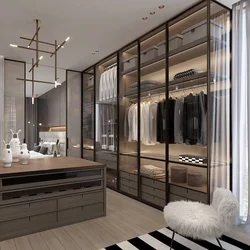 Glass wardrobe in the bedroom interior