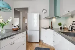 Light Refrigerator In The Kitchen Interior