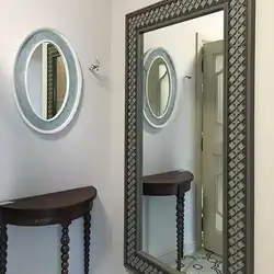 2 mirrors in the hallway photo