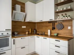 Photo of kitchen wood-effect countertop and facade