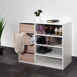 Chest Of Drawers With Shoe Rack In The Hallway Photo
