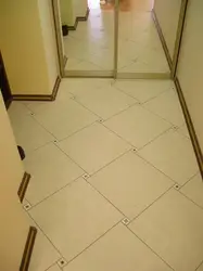 Tiles in the hallway photo on the floor and bathroom