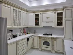 Classic White Kitchen With Gold Patina Photo