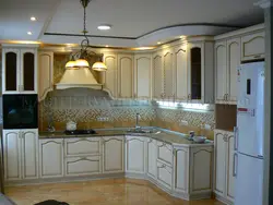 Classic white kitchen with gold patina photo