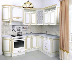 Classic white kitchen with gold patina photo