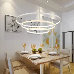 Chandeliers in the interior of a white kitchen