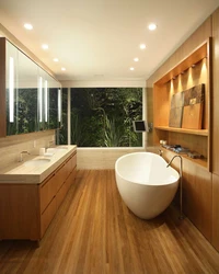 Bathtub with wooden floor photo