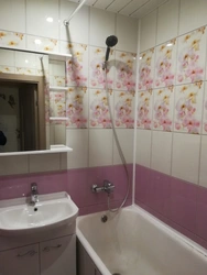 Finishing of a combined bathroom with plastic panels photo