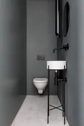 Gray toilet in the bathroom interior