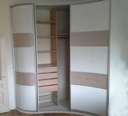 Corner sliding wardrobe in the bedroom photo