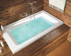 Photo of a bathtub with water in an apartment