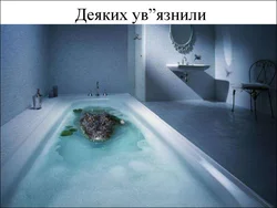 Photo of a bathtub with water in an apartment