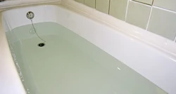 Photo Of A Bathtub With Water In An Apartment