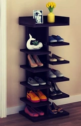 Corner shoe racks in the hallway photo