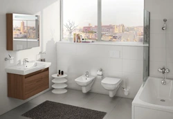 Bathtub with wall-hung toilet photo