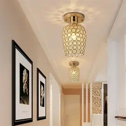 Chandelier in a small hallway photo in the interior
