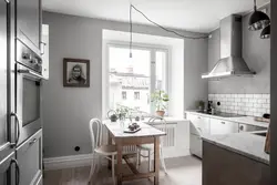 Серый скандинавский интерьер кухни