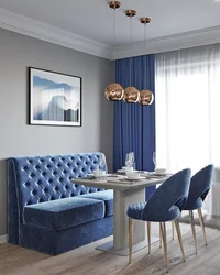 Blue sofa in the interior of the kitchen living room photo